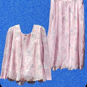 Pink floral print skirt and top set.